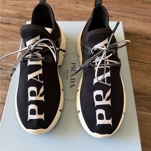 Prada Black and White Logo Knit Slip-On Sneakers